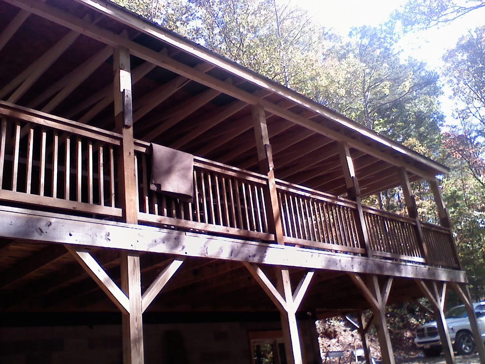 Timber framing under a new elevated porch and deck — Roof Leak Repair in Taylorville by Roofing Brothers